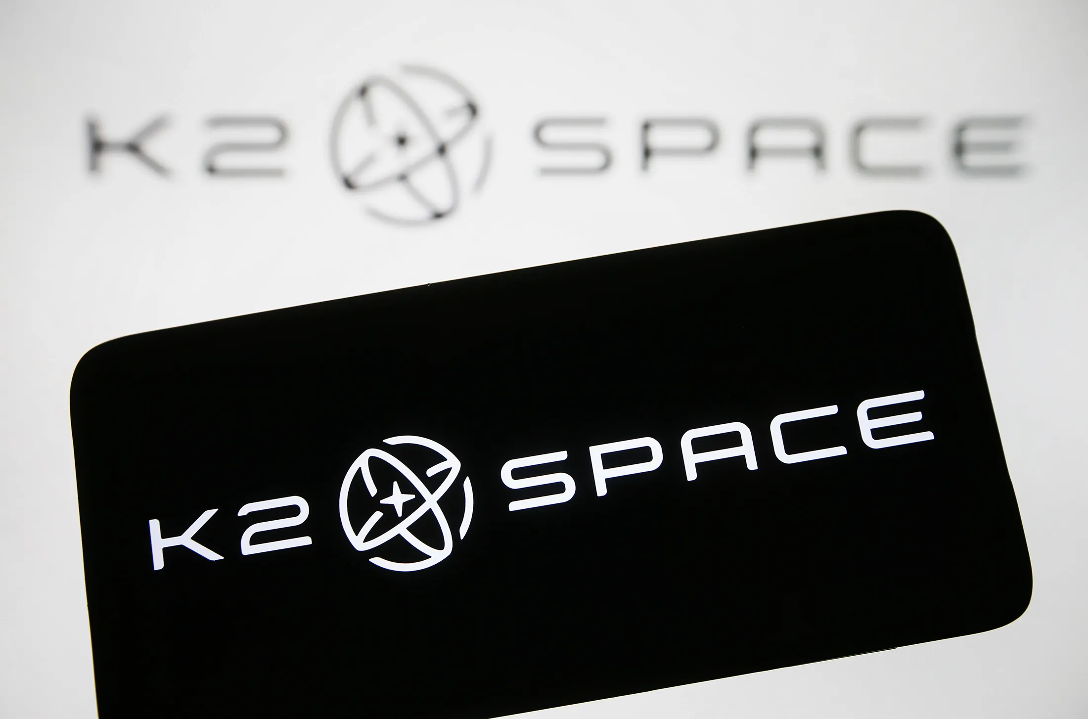 K2 Space raises $500 million in funding at a $6.8 billion valuation to accelerate satellite production; CEO Karan Kunjur emphasizes scaling efforts.