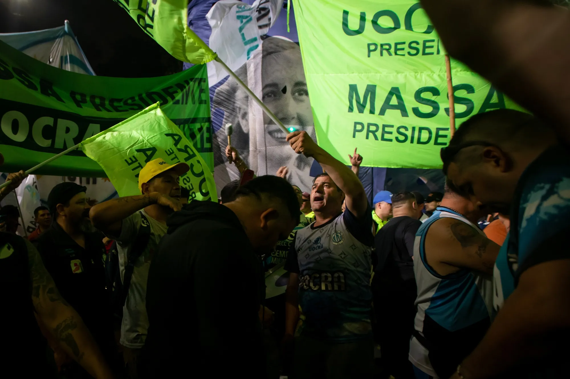 People celebrate during an election night rally in Buenos Aires, Argentina on Oct. 22.