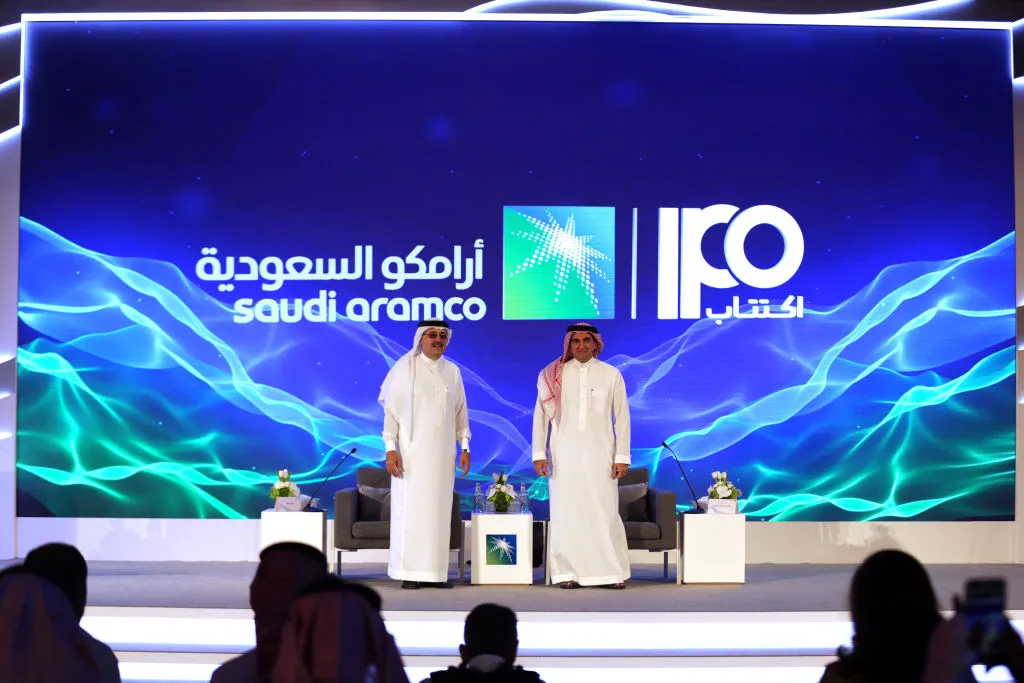 Amin Nasser, chief executive officer of Saudi Arabian Oil Co., left, and Yasir Al-Rumayyan, chairman