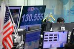 The rate of the yen against the U.S. dollar displayed in a Tokyo trading room Thursday.