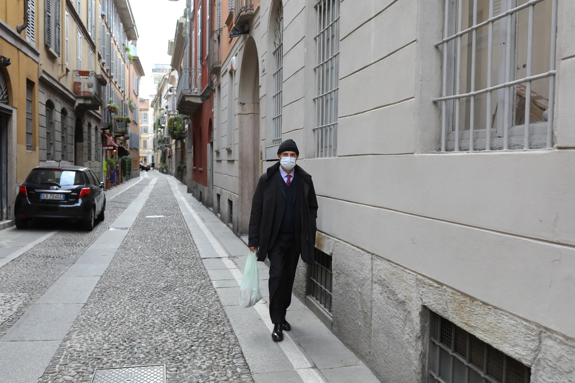 Masked in Milan.