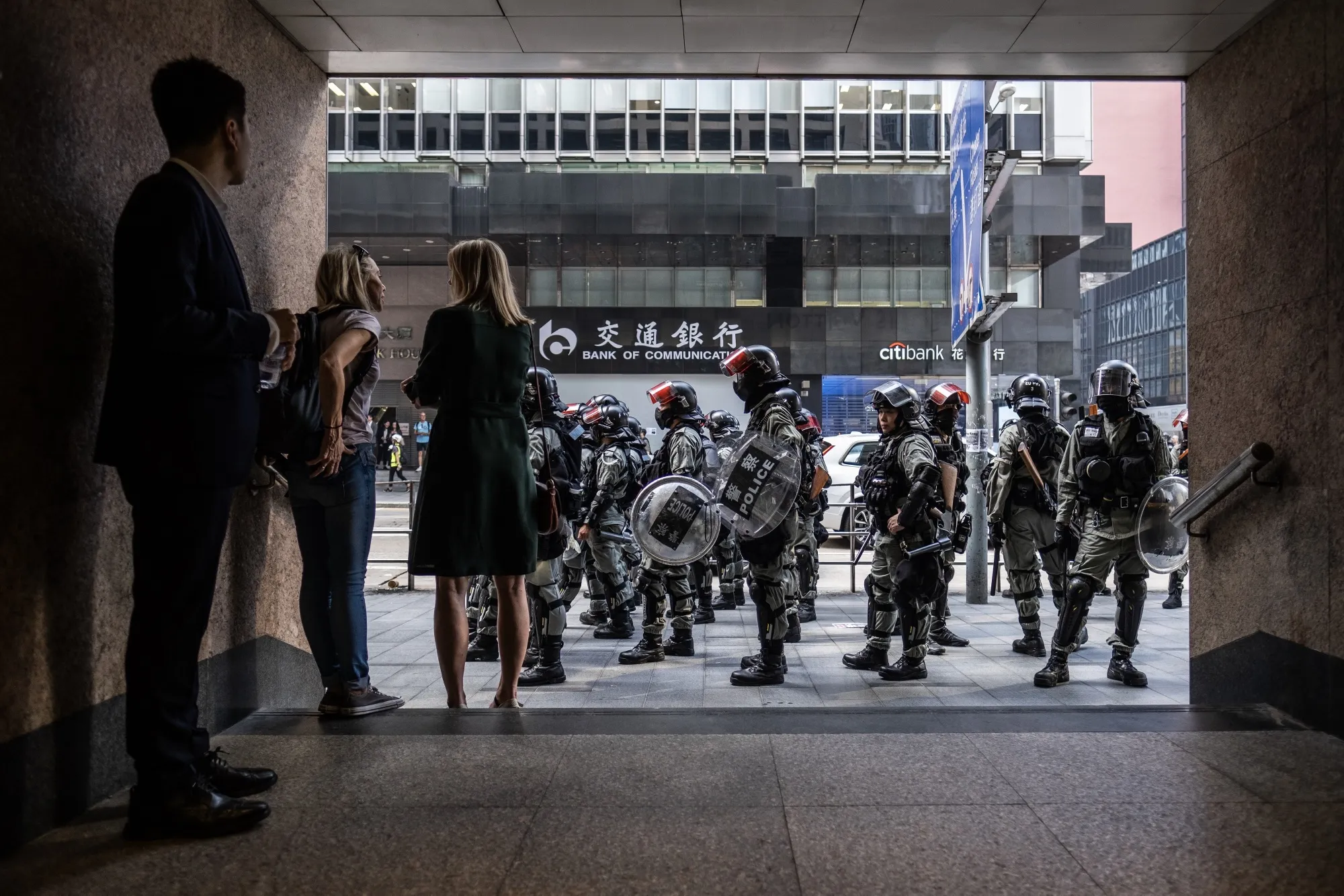Riot police stand guard outside an entrance to Central Station during a protest in Hong Kong&nbsp;on&nbsp;Nov. 18.&nbsp;