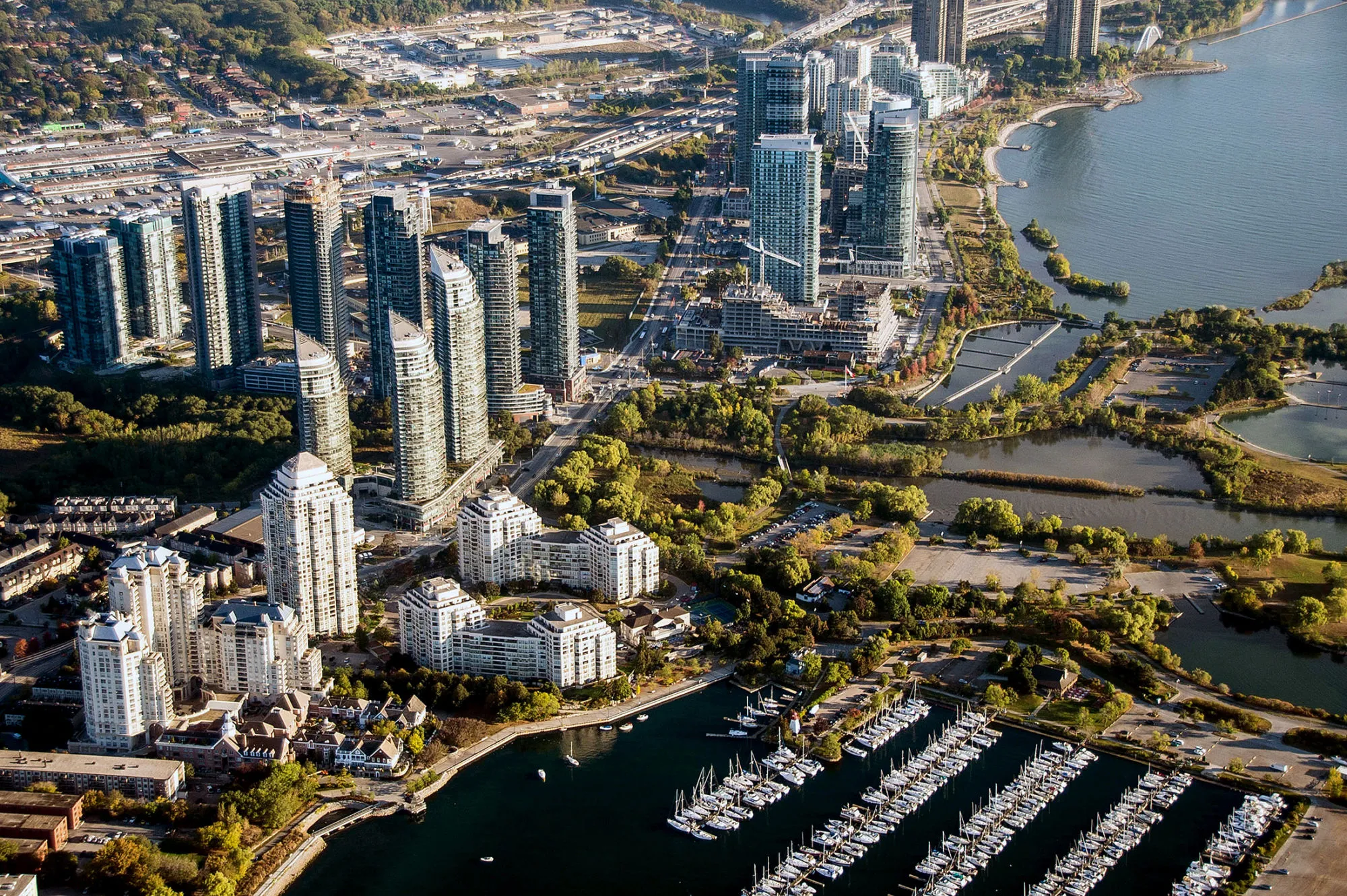 Condominiums stand along the shore of Lake Ontario in this aerial photograph taken above Toronto, Ontario, Canada, on Monday, Oct. 2, 2017.&nbsp;