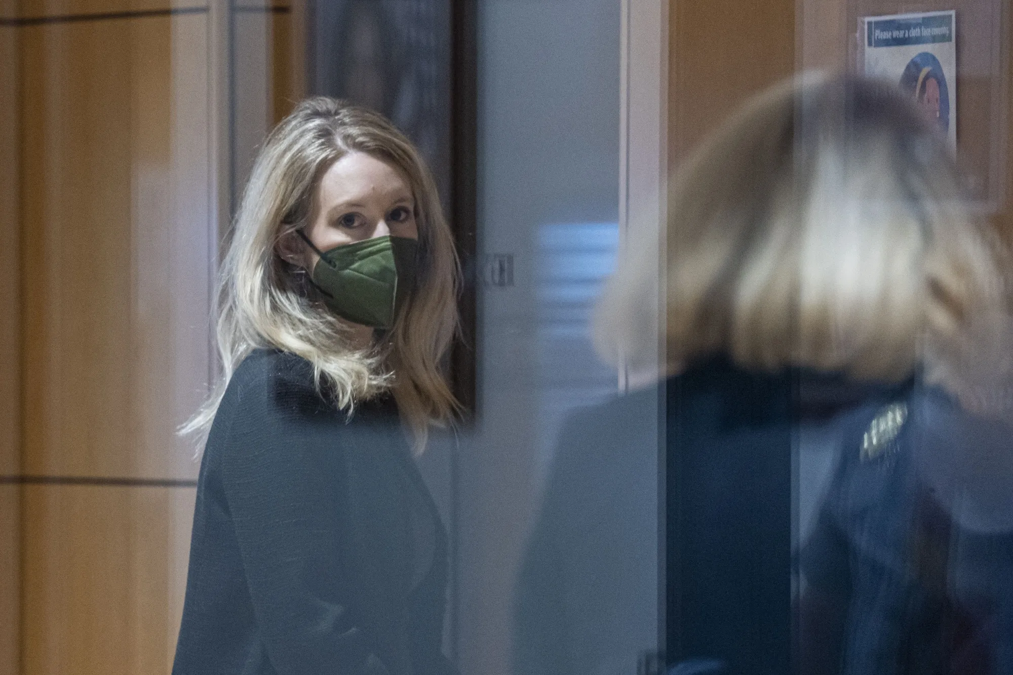 Elizabeth Holmes arrives at federal court in San Jose on Oct. 12.