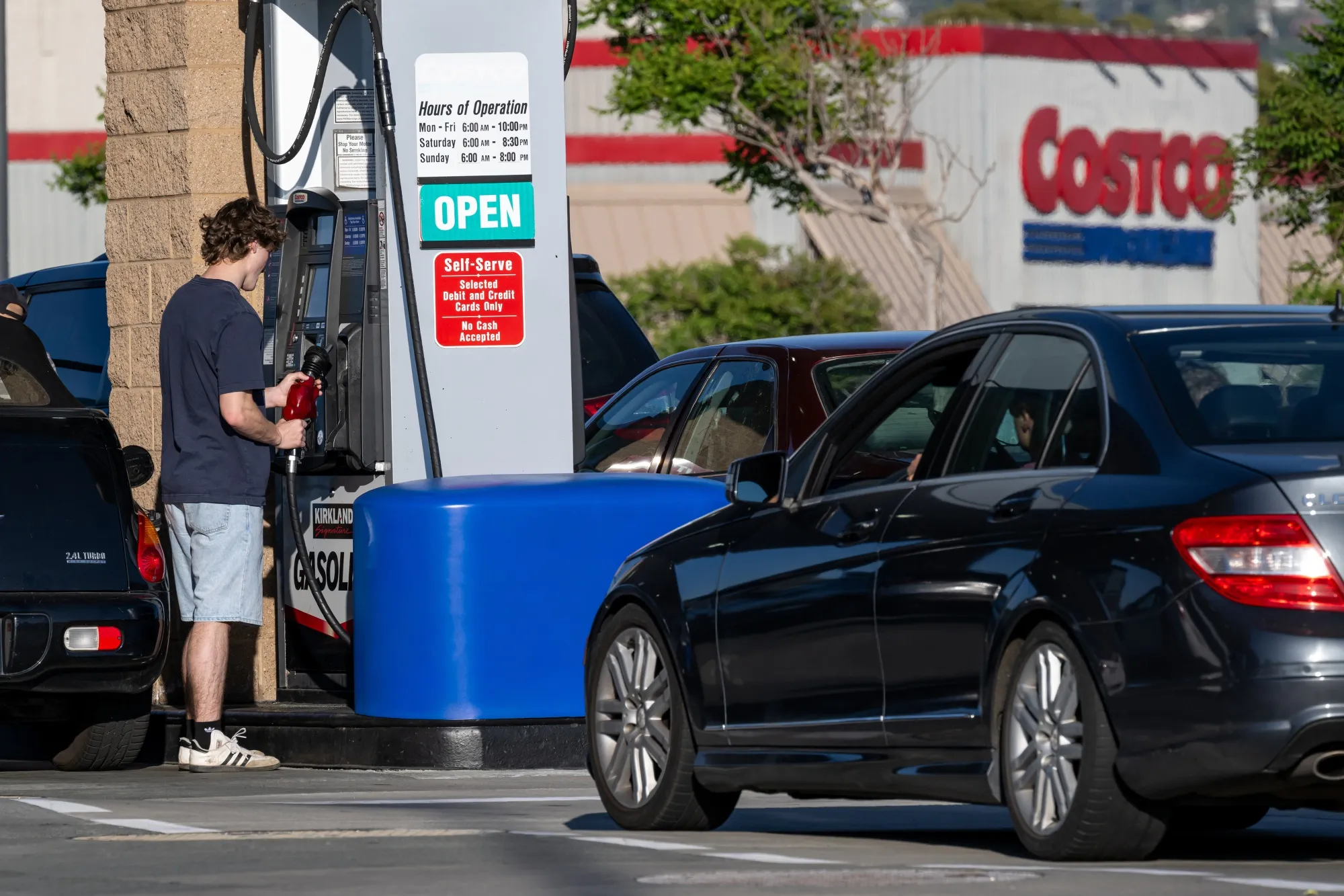 A driver refuels a vehicle at a Costco gas station in Richmond, California. The administration is searching for ways to offset rising gas prices.