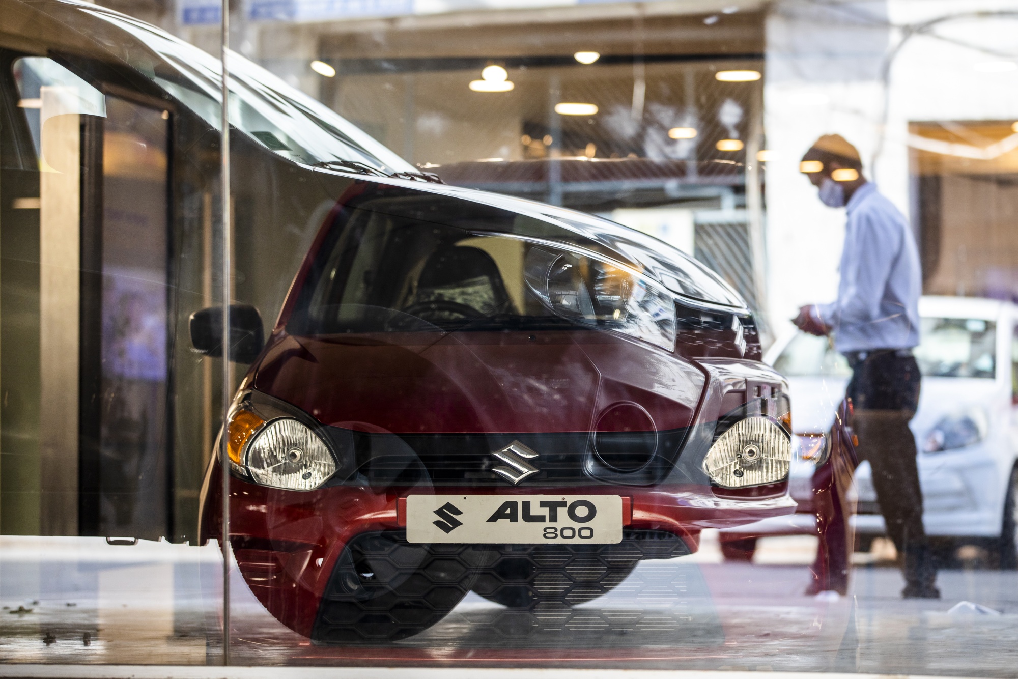 A Maruti Suzuki&nbsp;Alto vehicle at one of the automaker's showrooms in New Delhi.