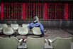 People's Bank Of China Headquarters And A Brokerage As Investors React to National People Congress Policies