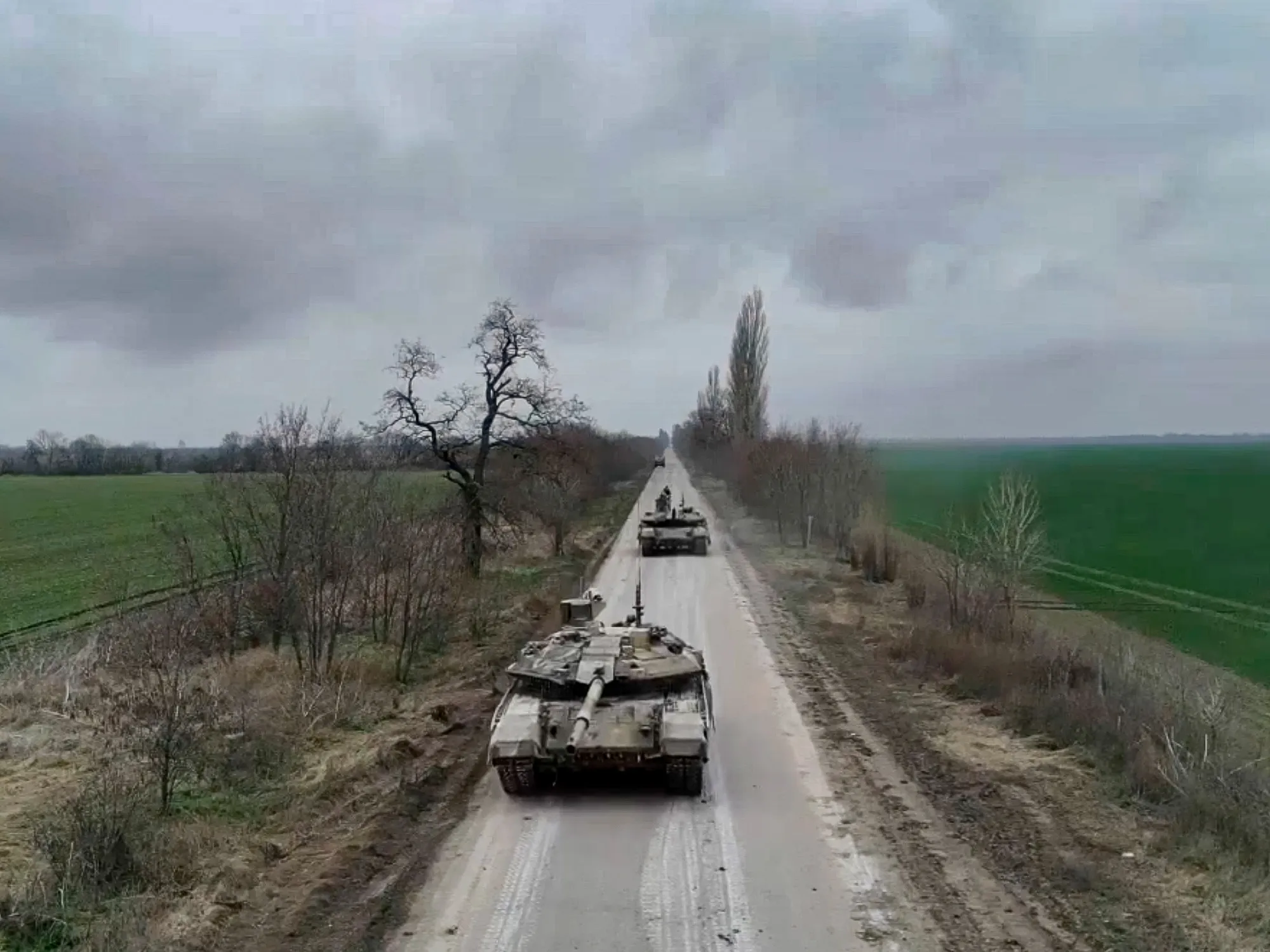 In this photo taken from video and released&nbsp;in January 2023, Russian tanks roll to their position at an undisclosed location in Ukraine.&nbsp; Photo: Russian Defense Ministry Press Service/AP Photo
