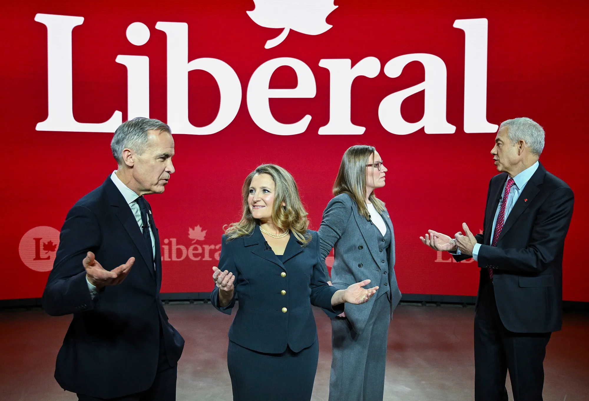 Mark Carney, from left, Chrystia Freeland, Karina Gould, and Frank Baylis.