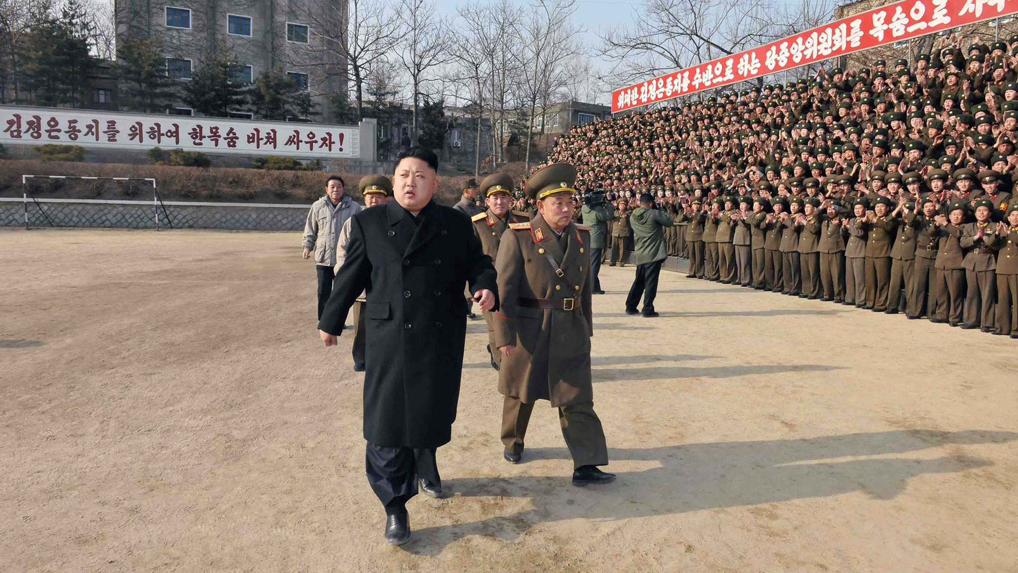 This undated picture released from North Korea's official Korean Central News Agency (KCNA) on January 12, 2014 shows North Korean leader Kim Jong-Un (front L) inspecting the command of Korean People's Army (KPA) Unit 534.
