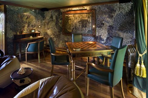Bowie's old game room, with walls covered in handpicked seashells.