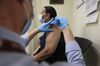 A person receives a dose of the Johnson & Johnson Janssen Covid-19 vaccine in New York on March 25. 