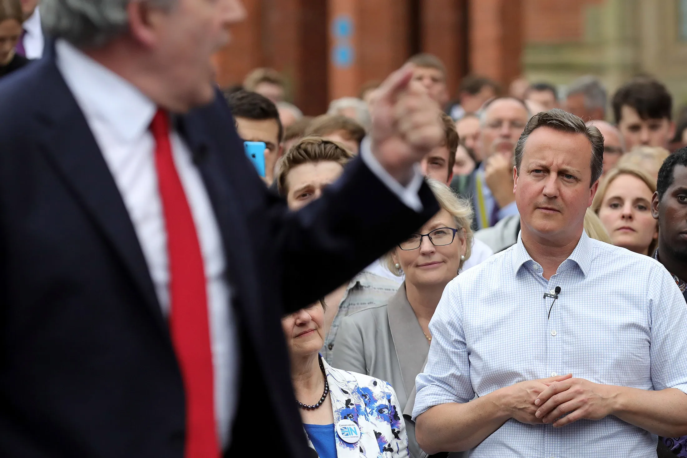 U.K. Prime Minister David Cameron listens to former Prime Minister Gordon Brown speaking at Birmingham University on June 22, 2016.
