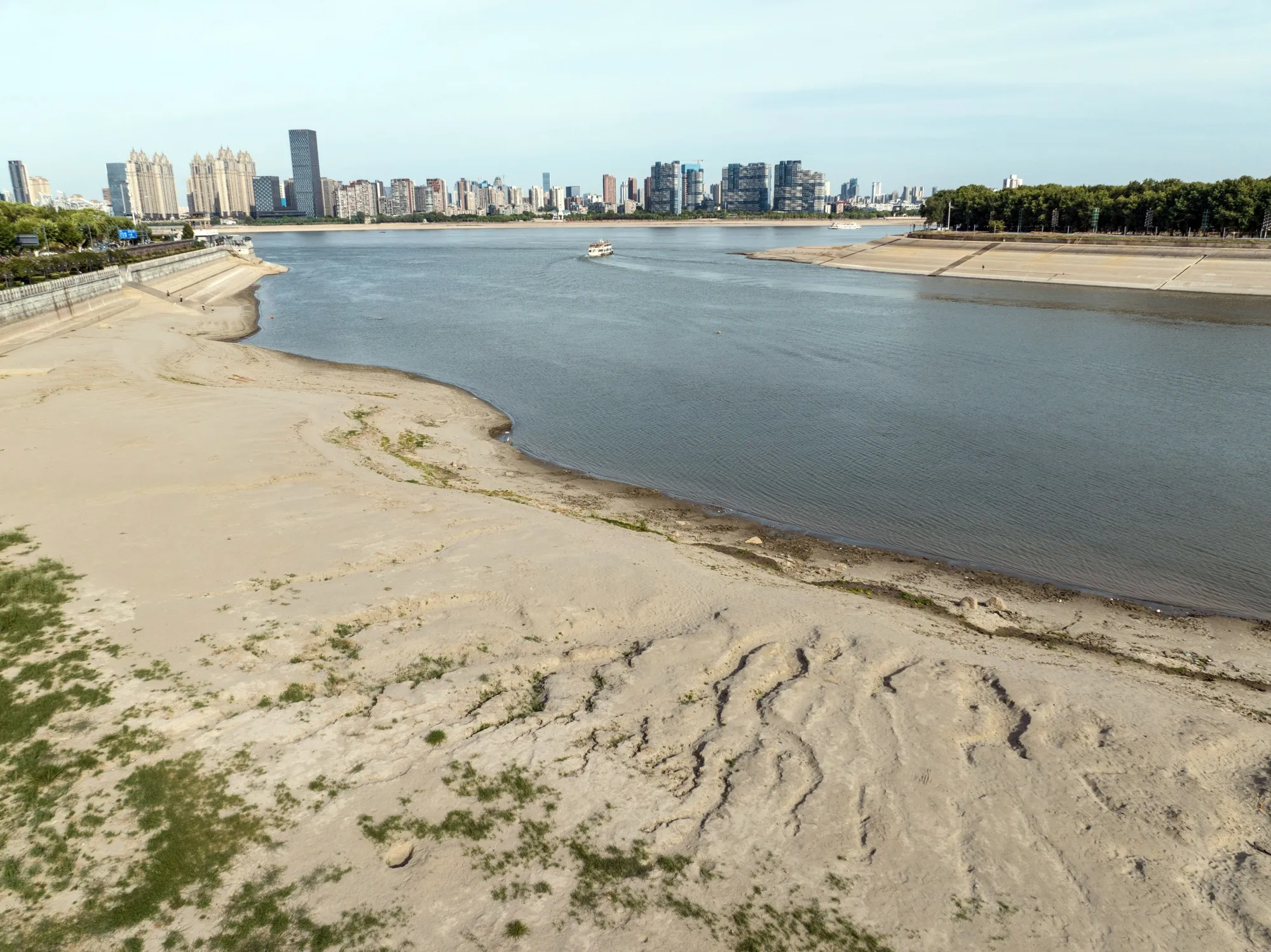 Exposed banks, due to low water levels caused by drought, along the Han River near the confluence with the Yangtze River in Wuhan, on Aug. 22.