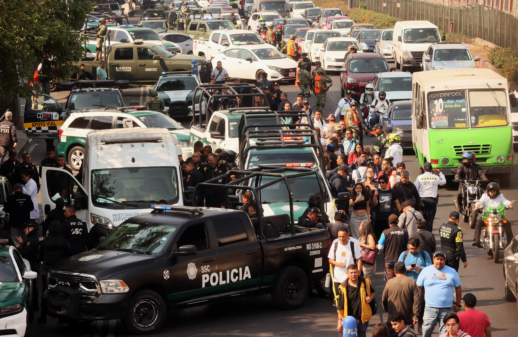 Forensic investigators at the crime scene in Mexico city on May 20.