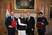 Narendra Modi, and Keir Starmer after signing a free trade agreement on July 24.
