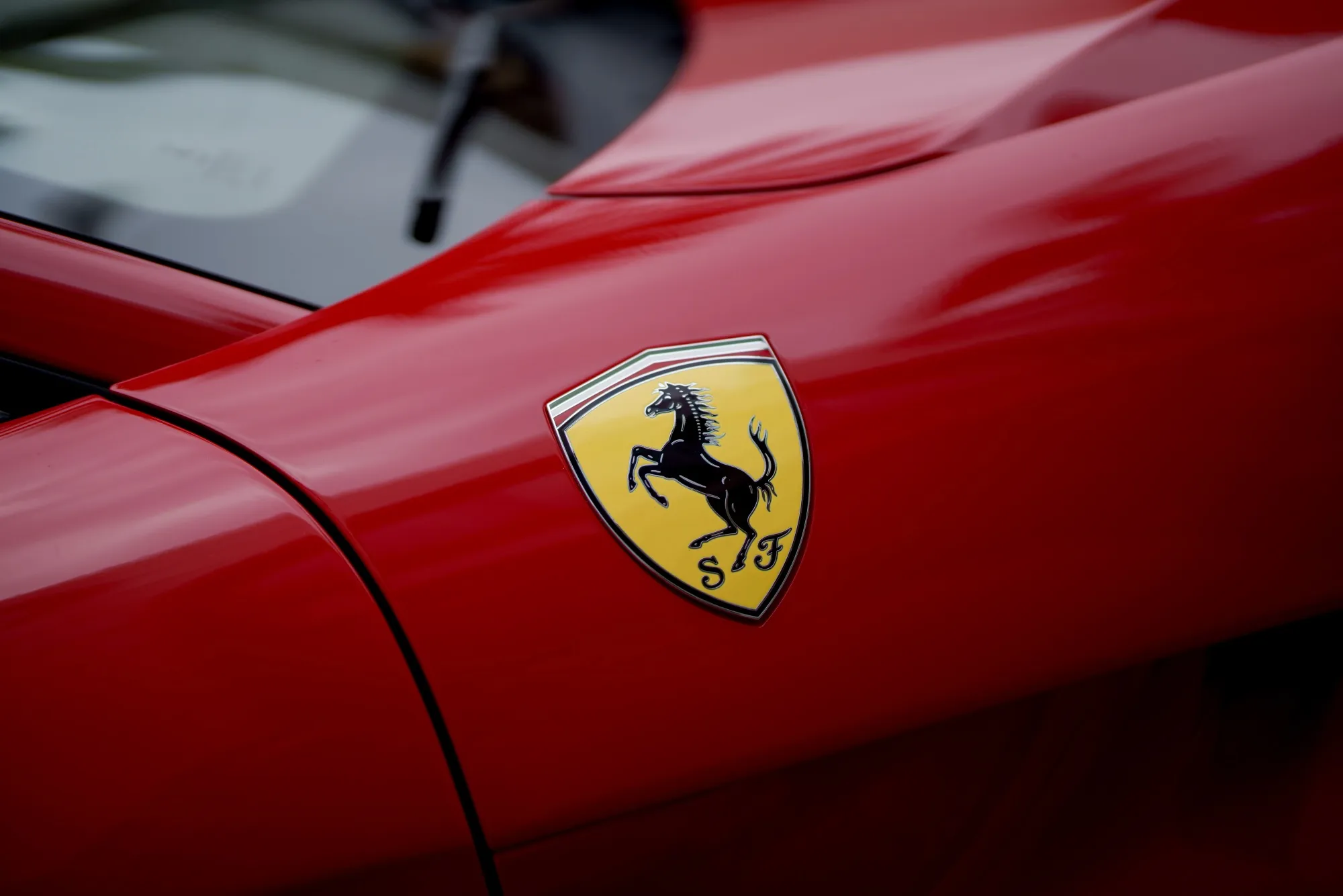 A Ferrari vehicle parked on Rodeo Drive in Beverly Hills, California.