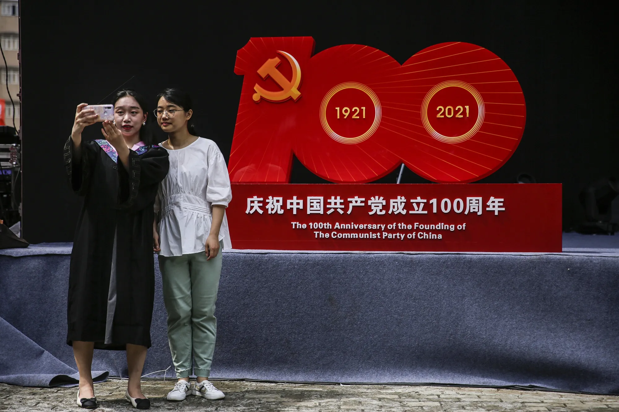 Now the celebrations are over, will China let its economy slow further?