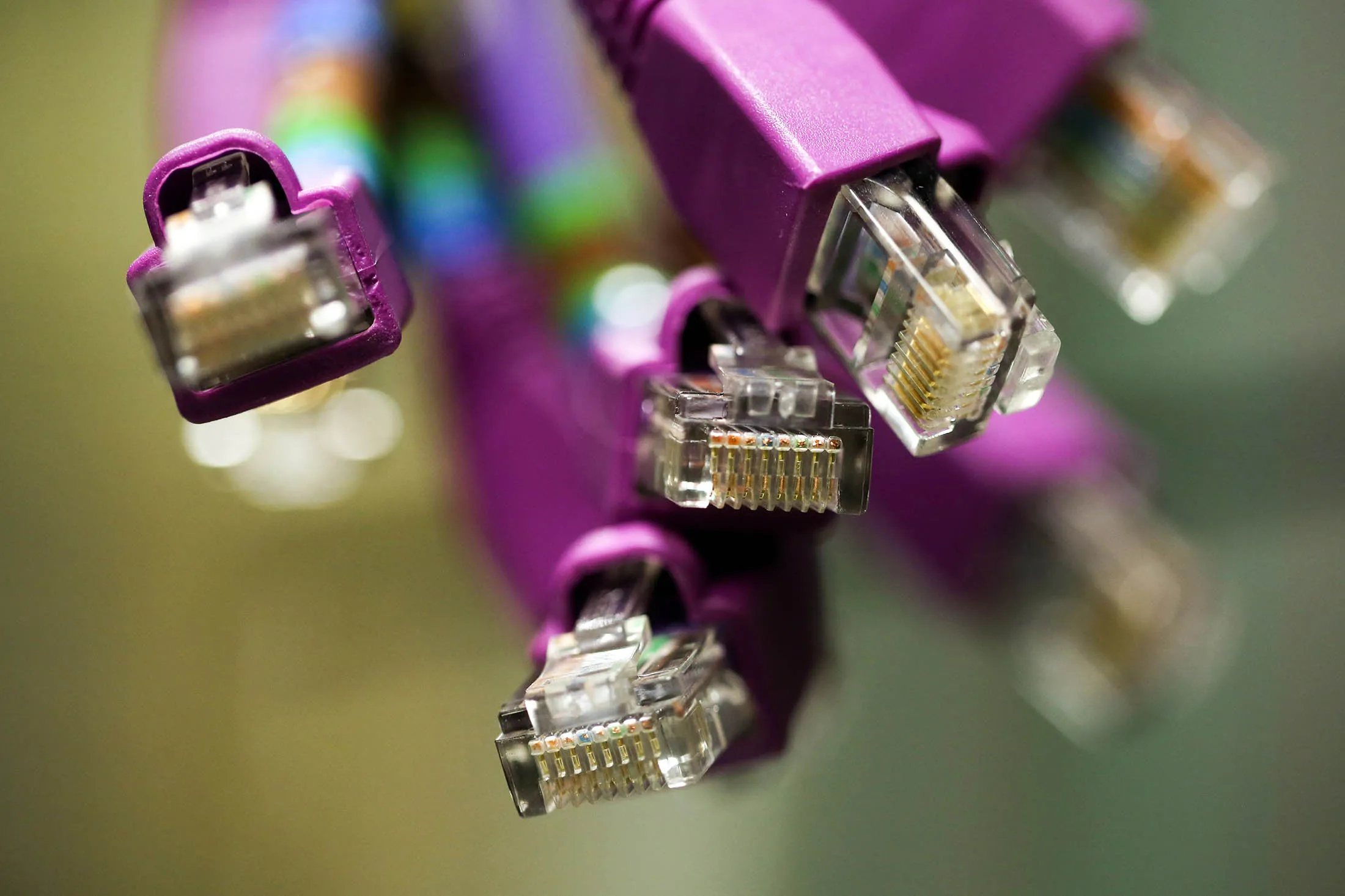 Terminals of data cables sit inside a comms room at an office in London, U.K., on Friday, Oct. 16, 2015. A group of Russian hackers infiltrated the servers of Dow Jones &amp; Co., owner of the Wall Street Journal and several other news publications, and stole information to trade on before it became public, according to four people familiar with the matter.
