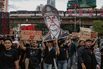 Crowds of Black-Clad Malaysians Protest Against Anti-Graft Chief