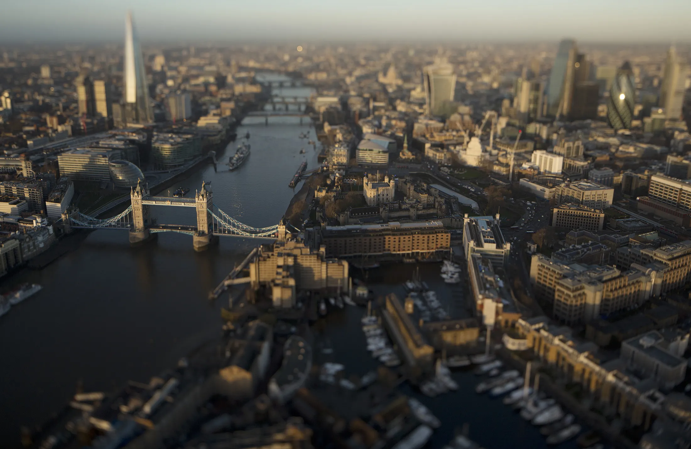 Tower Bridge spans the River Thames in London.
