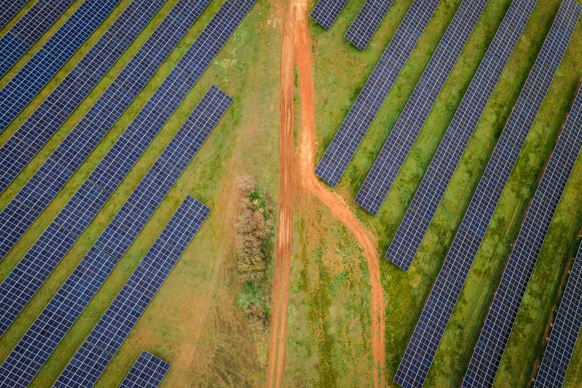 Rows of photovoltaic panels at the Iberdrola SA BaCa hybrid wind-solar plant in the Vallejera district of Burgos, Spain.
