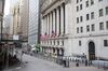 American flags hang on display outside the New York Stock Exchange (NYSE) in New York, U.S., on Wednesday, June 10, 2020. New York City, which experienced the biggest and deadliest Covid-19 outbreak in the country, began reopening on June 8.