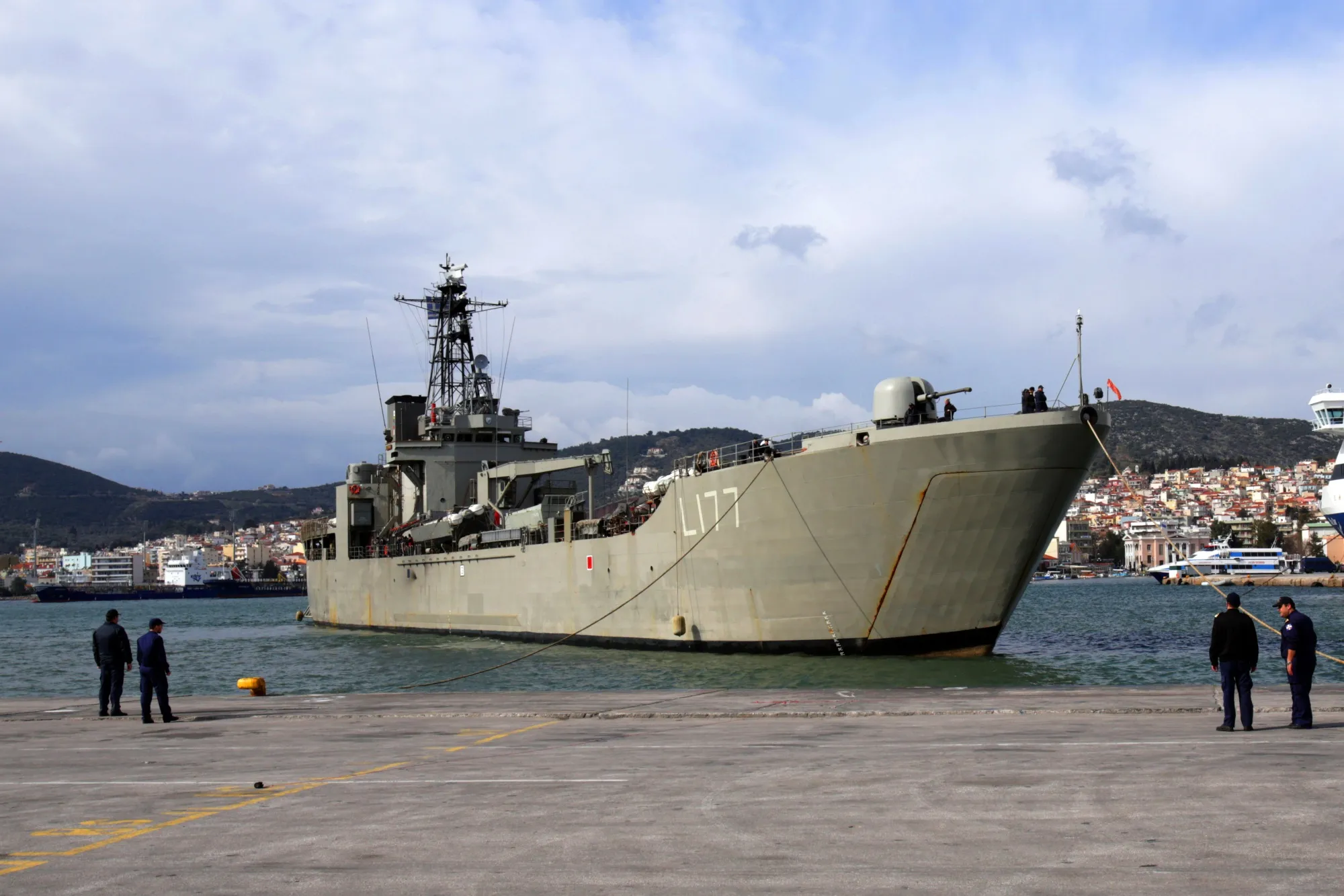 A Greek navy carrier docks in the port of Mytilene on the island of Lesbos.