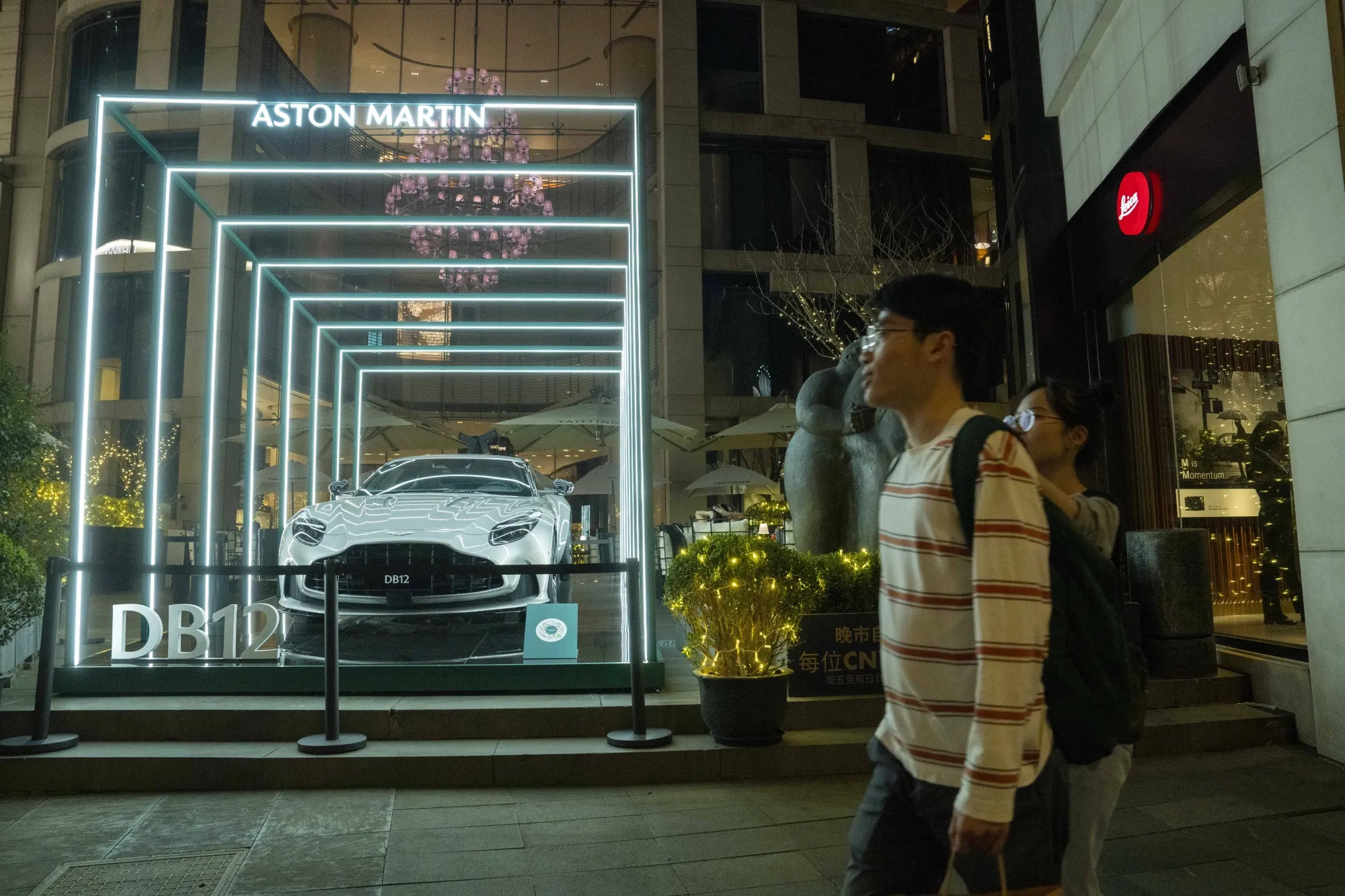 An Aston Martin DB12 vehicle on display in the Xintiandi shopping area in Shanghai.