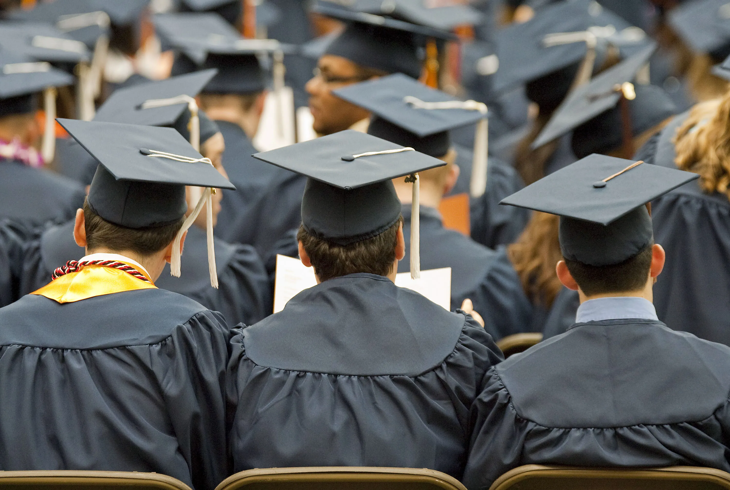 Students during a university commencement ceremony in Syracuse, N.Y.
