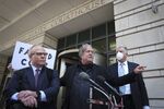 L-R Robert J. Costello, Steve Bannon and David Schoen on June 15 in Washington, DC.