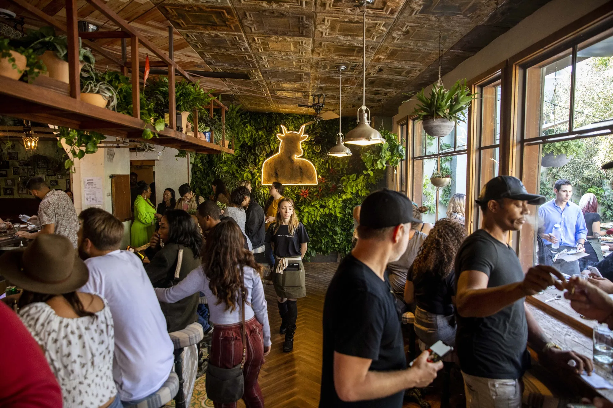 Customers smoke marijuana at the Lowell Cafe cannabis lounge in West Hollywood.&nbsp;33 states have already adopted medical or adult use of cannabis.