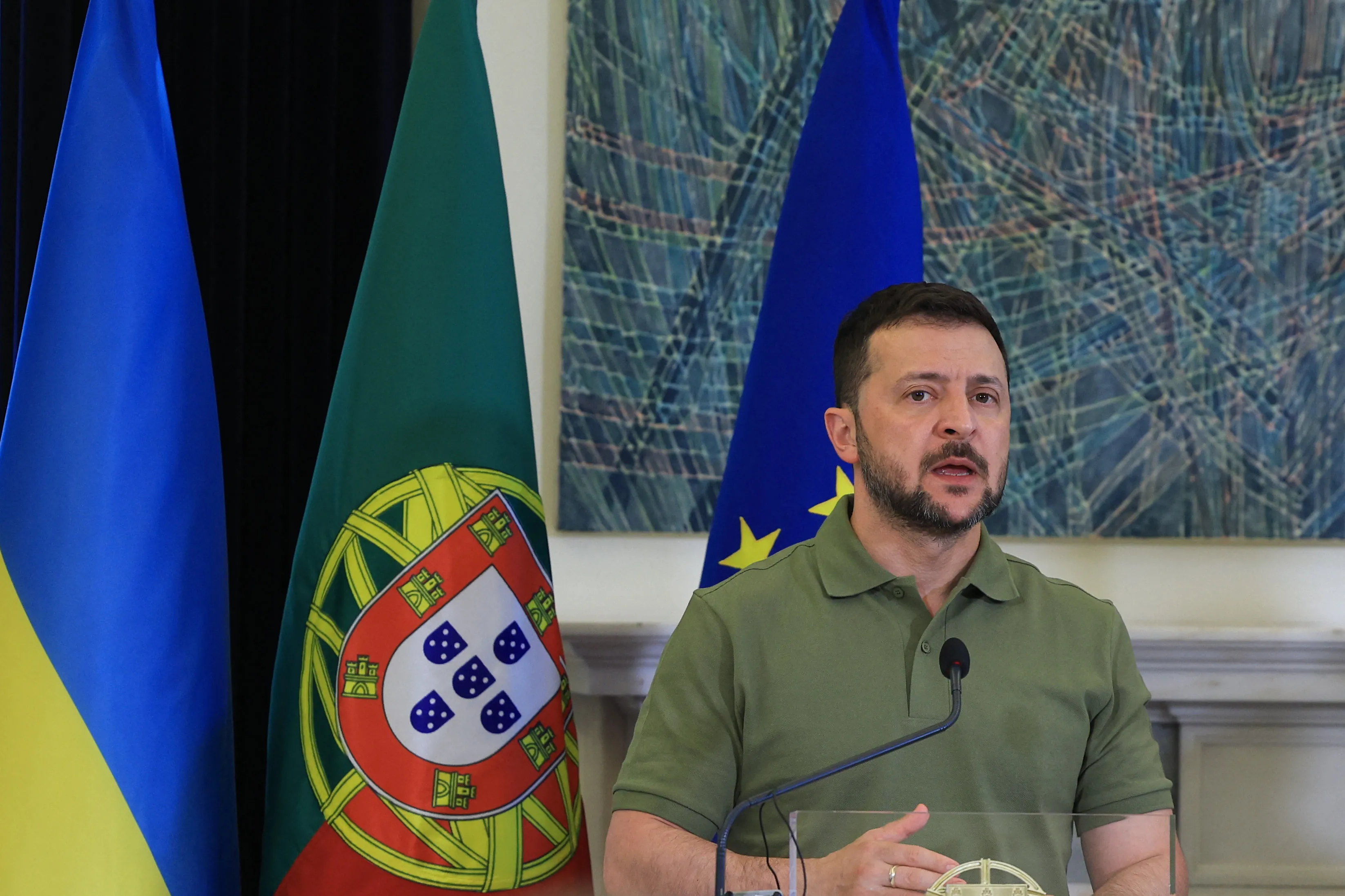 Ukraine's President Volodymyr Zelensky addresses a press conference with the Portuguese Prime Minister after their meeting at Sao Bento Palace in Lisbon on May 28,