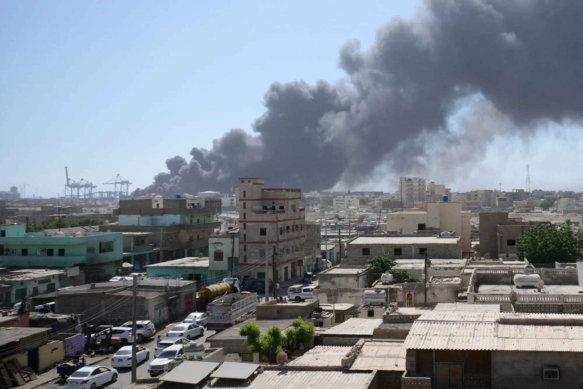 Smoke billows after a drone strike on the port of Port Sudan on May 6.