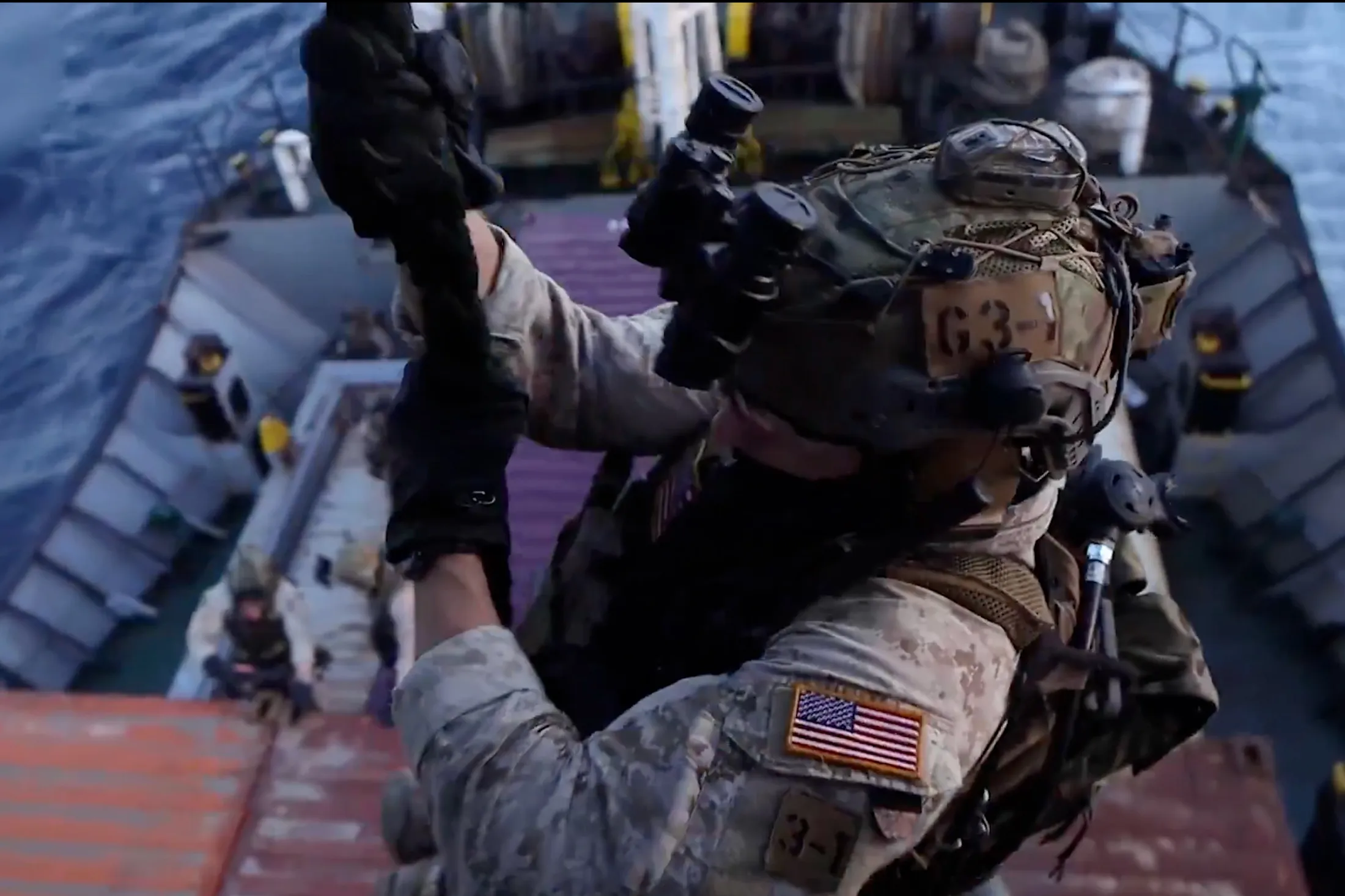 US Marines board the Blue Star III commercial ship during blockade operations, in a still from video released by US Central Command on April 28.