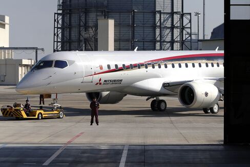 Mitsubishi Aircraft Corp. Unveils First MRJ Passenger Jet After Four-Year Delay
