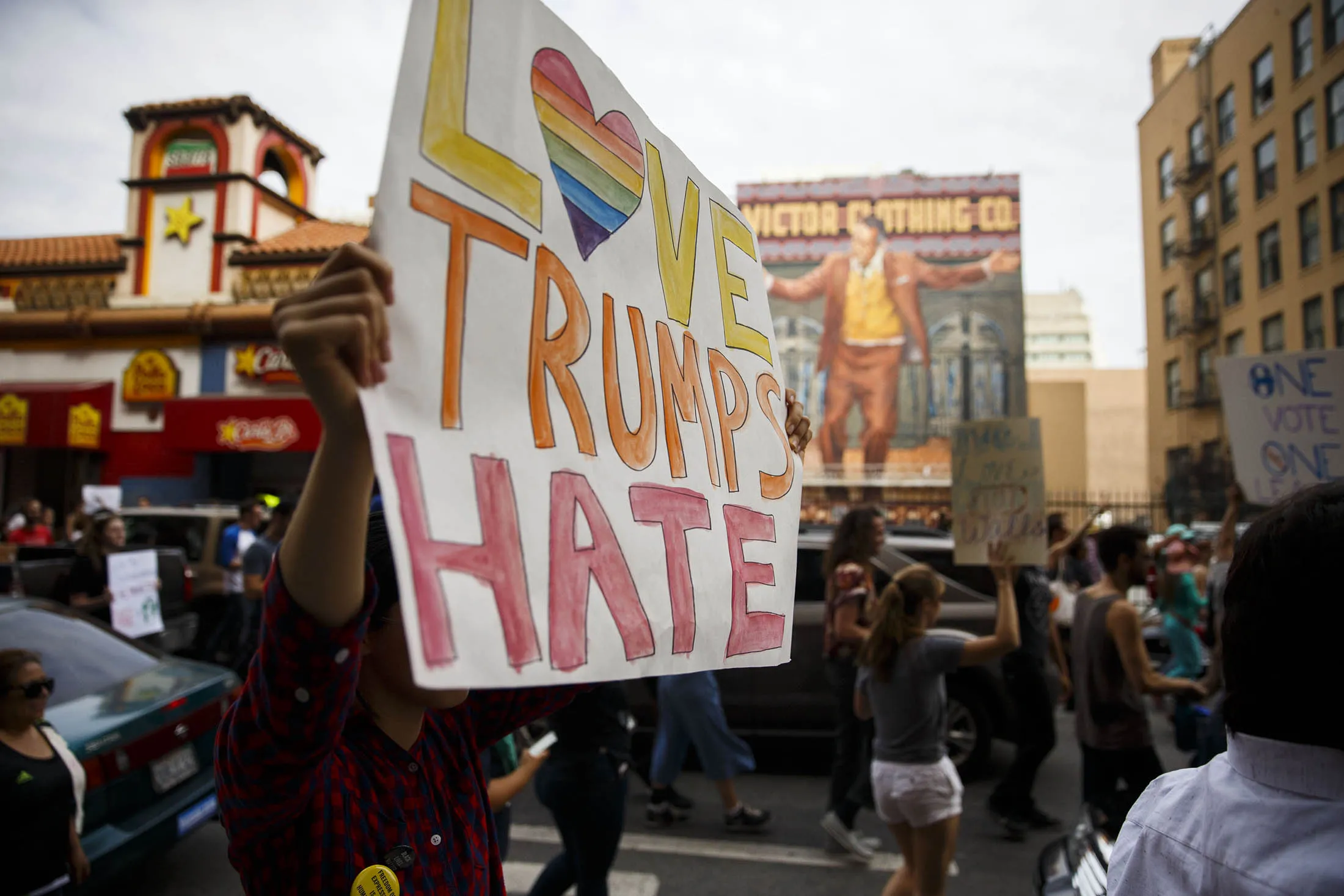 A demonstrator holds a 'Love Trumps Hate' sign during a protest in Los Angeles on Nov. 12.
