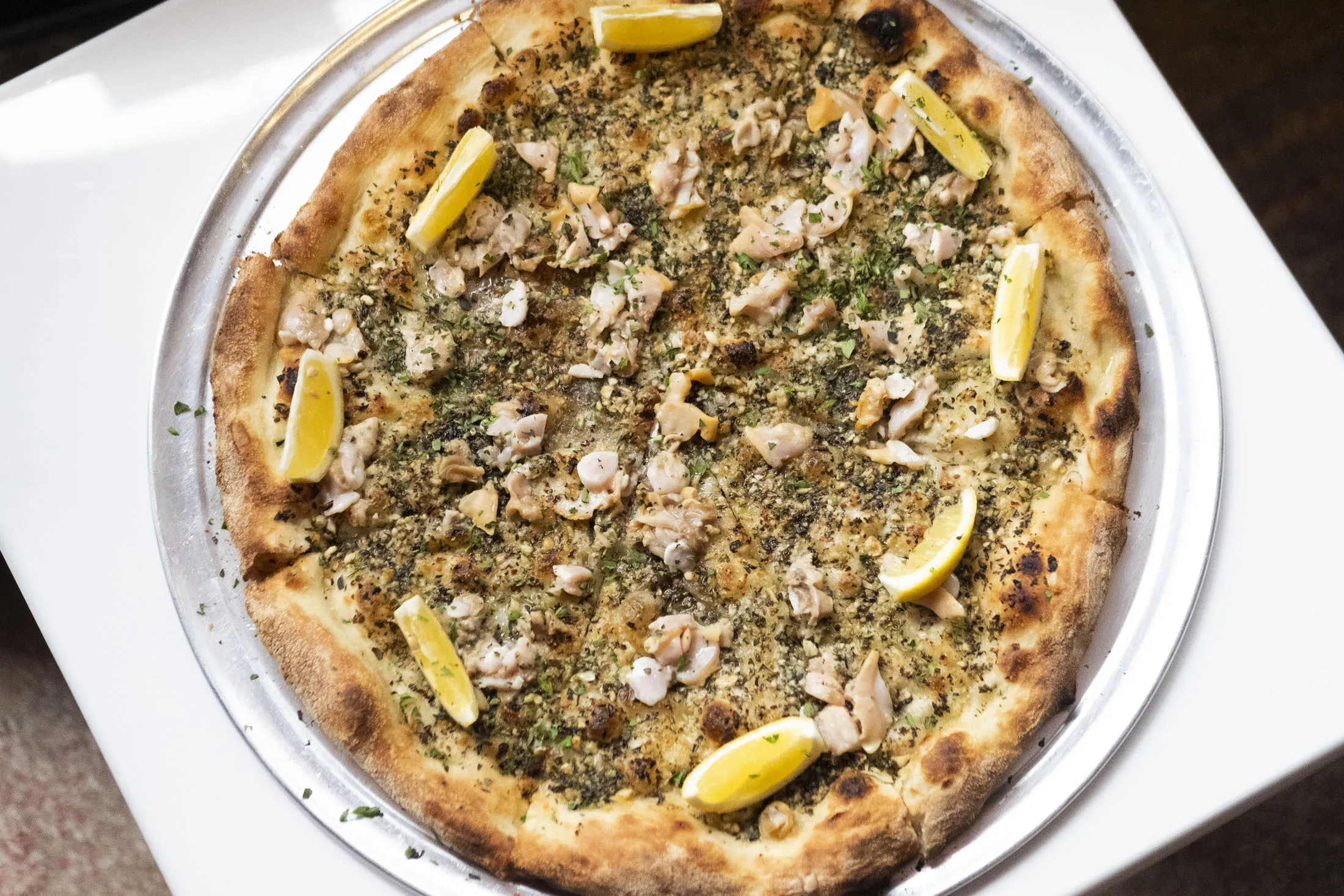 Bellucci’s clam pie is worth planning ahead for.
