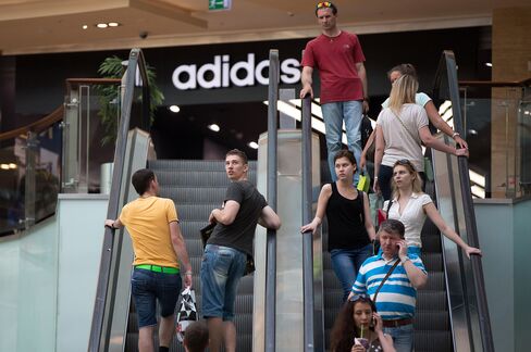 Adidas Cuts Forecasts After Quarterly Profit Misses Estimates