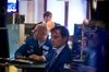 Traders work on the floor of the New York Stock Exchange (NYSE) in New York, U.S., on Tuesday, July 16, 2019.