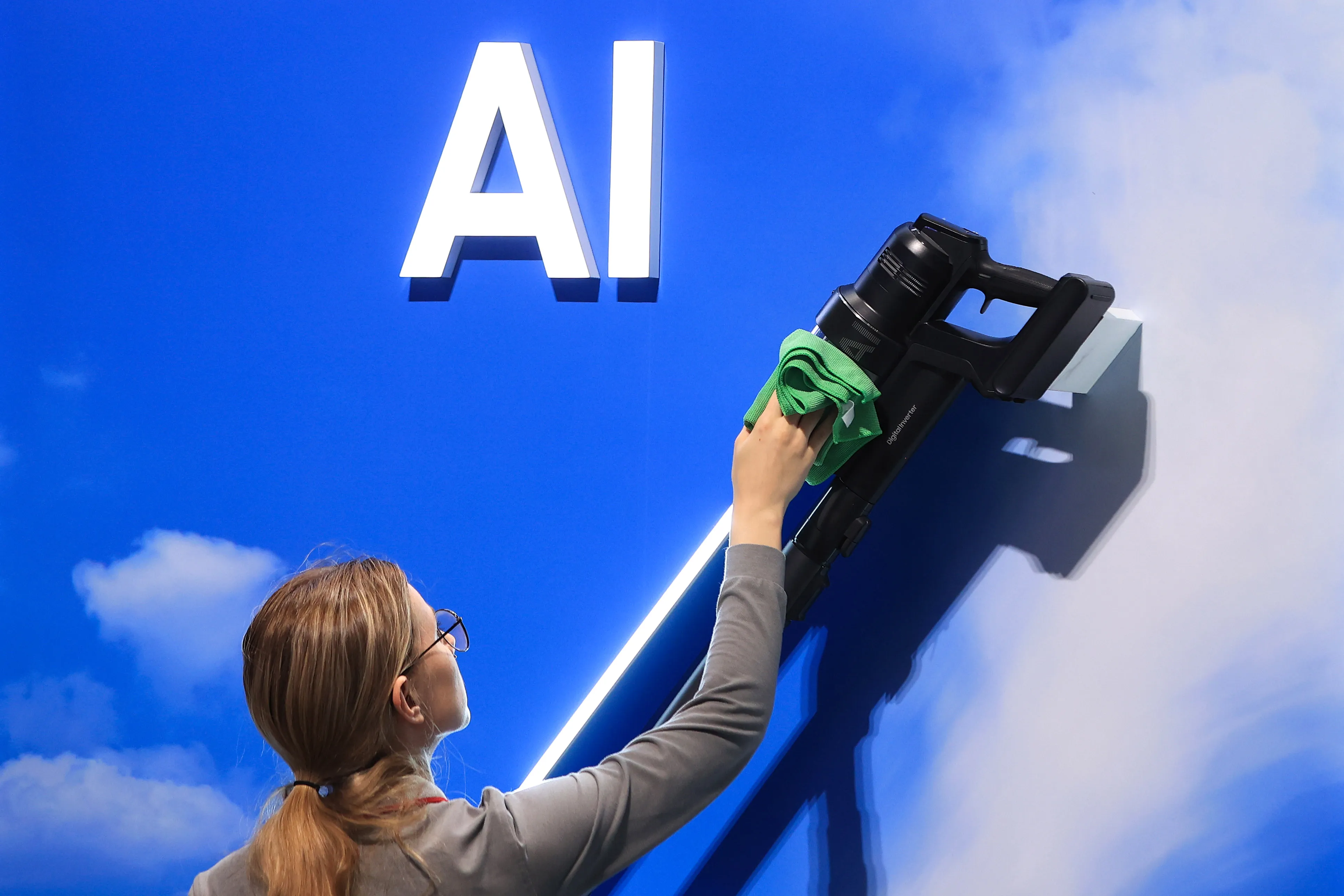 A worker dusts a Bespoke Jet AI vacuum cleaner at the IFA&nbsp;trade fair in Berlin.