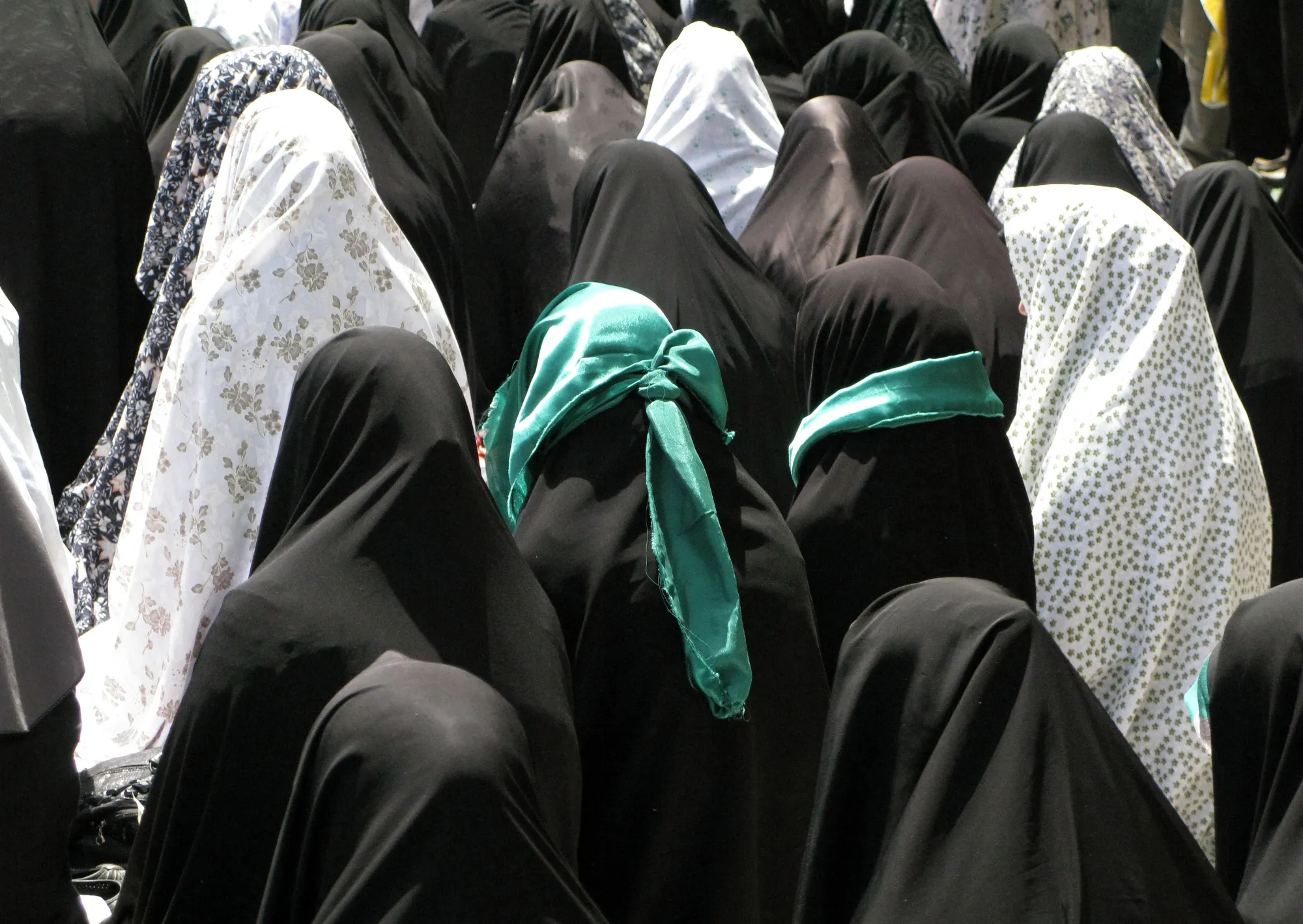 The signature green of Iran’s protest movement is not going away.