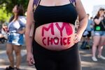 A slogan written on an abortion rights demonstrator's body, outside the US Supreme Court in Washington, D.C., on June 25.