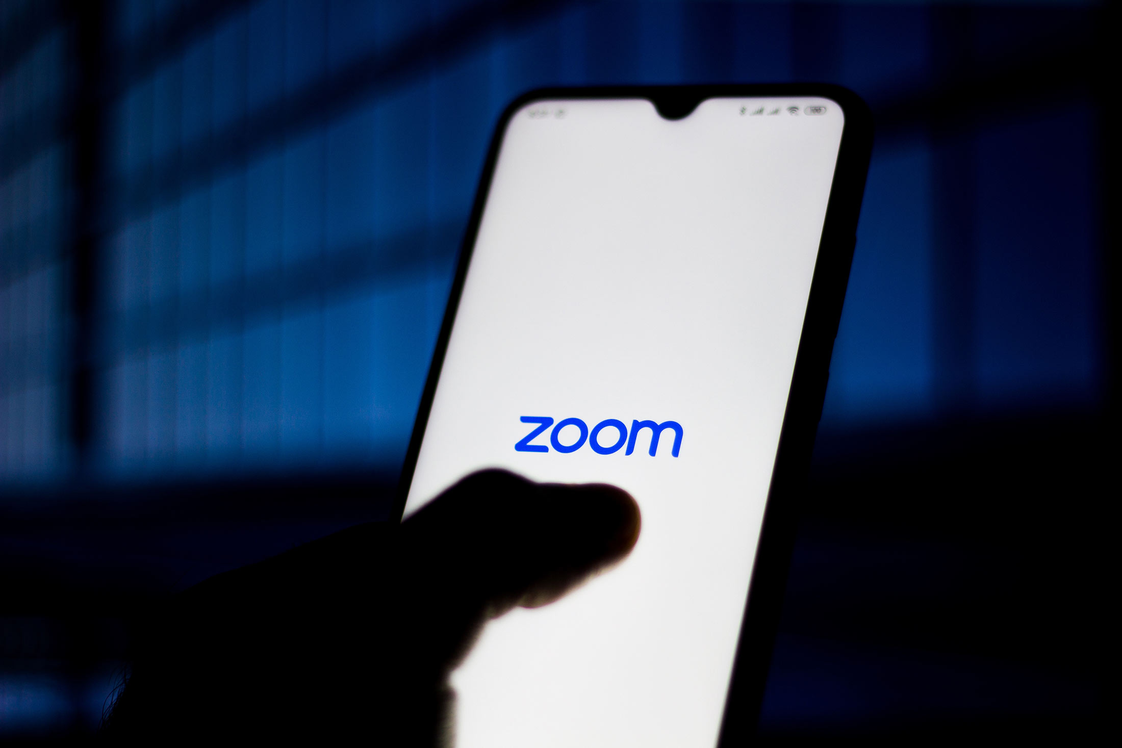In this photo illustration Zoom Meetings logo is seen