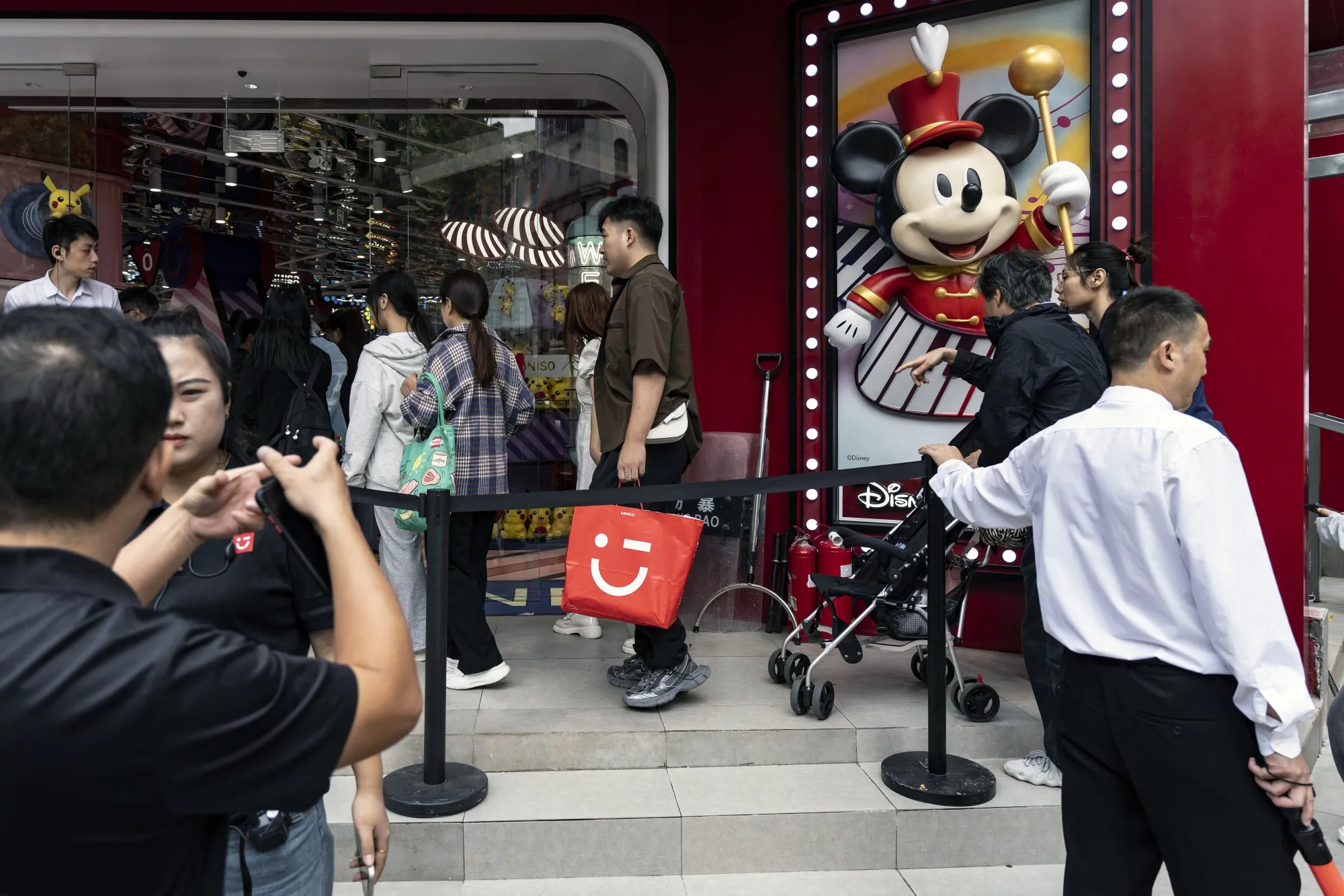 Shoppers and visitors walk down one of the main retail streets in Shanghai China&nbsp;in October.