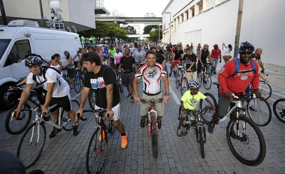 Cyclists gather and prepare to ride a 13-mile route though neighborhoods including Wynwood and Little Havana in downtown Miami.