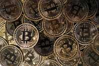 Bitcoins As Cryptocurrency Halts Decline After Drubbing on China's Offerings Ban