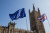 A flag of the European Union (EU), left, flies with a Union flag, also known as a Union Jack, near the Houses of Parliament in London, U.K., on Monday, April 1, 2019. Complicating the push for a resolution on Brexit is the internal jostling in the Tory Party among candidates seeking to succeed U.K. Prime Minister Theresa May after she promised last week to quit if she gets her deal approved.