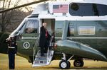 U.S. President Donald Trump gestures while boarding Marine One on the South Lawn of the White House in Washington, D.C., on Jan. 20.
