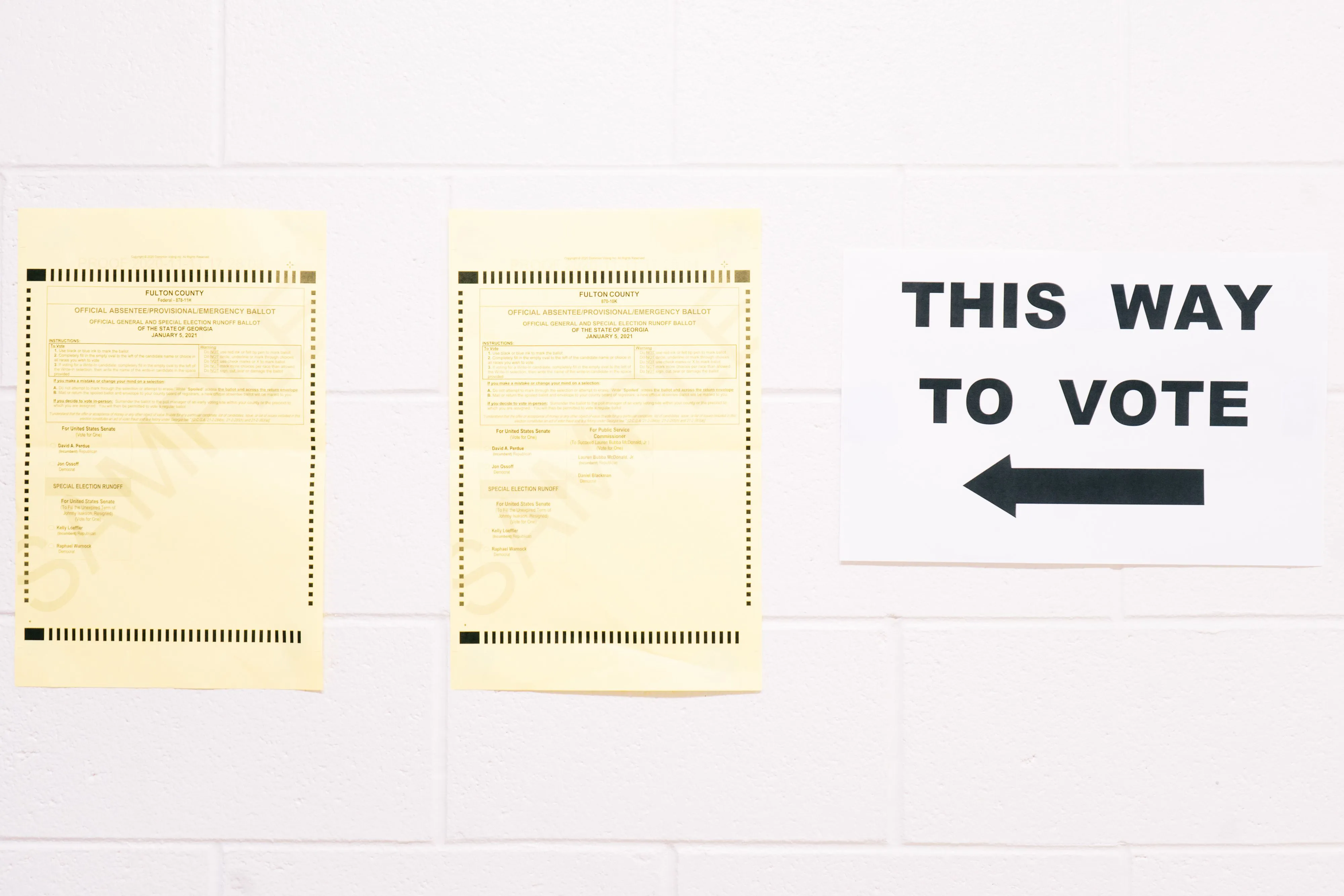A "This Way To Vote" sign and sample ballots inside of a polling location in Atlanta on&nbsp;Jan. 5, 2021.&nbsp;